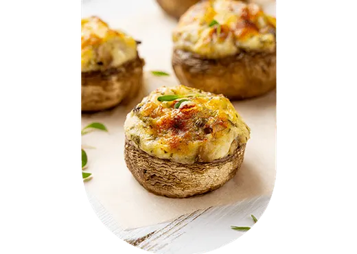 Champignons farcis au pesto de tomates et vin blanc